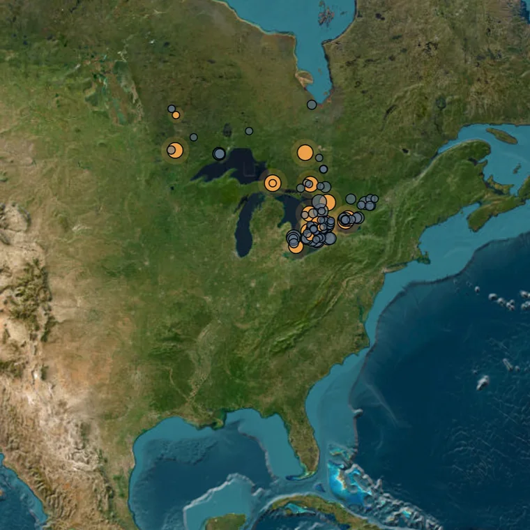 The Concordance map, with towns across the Great Lakes marked orange where their reports have been read and grey where they are located but not yet read