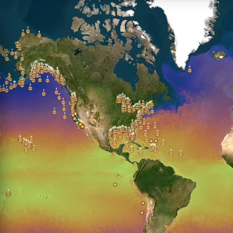 The OMEGA console showing live sea-surface temperature across the Pacific and Atlantic, with sensor stations marked along the coasts